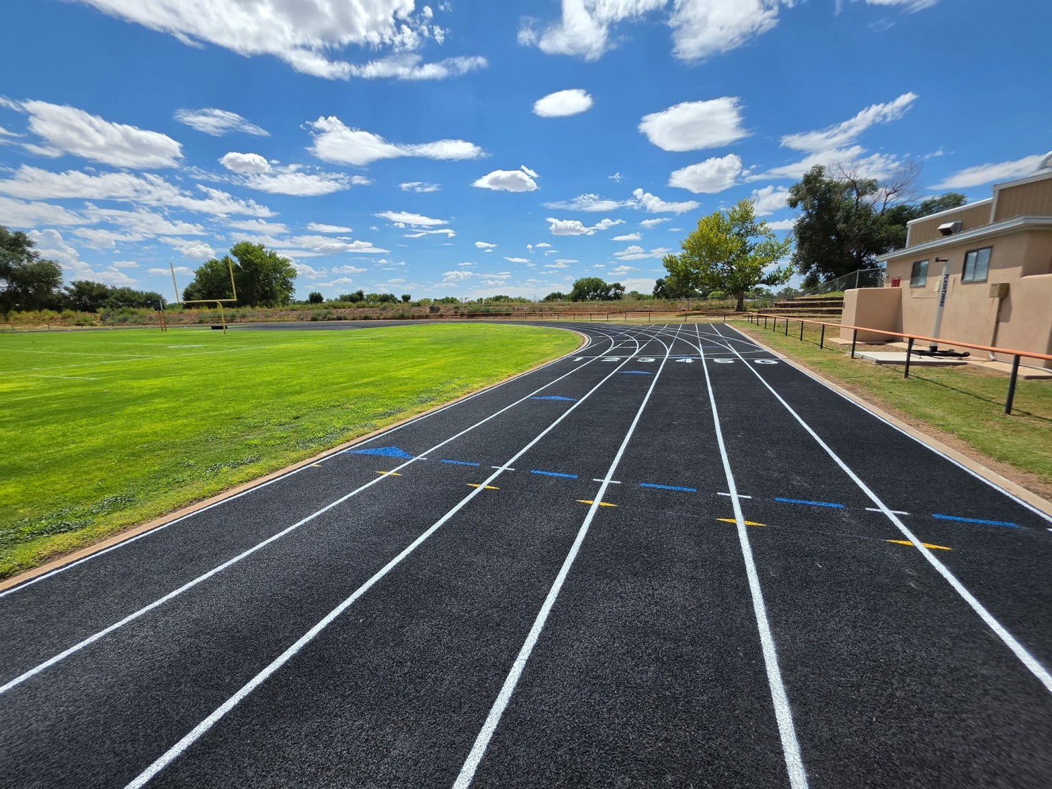 Rubber running track with fresh lane and event markings
