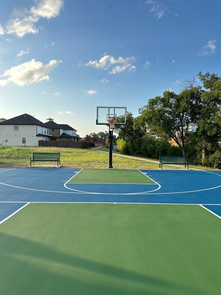basketball court and more with benches and goal