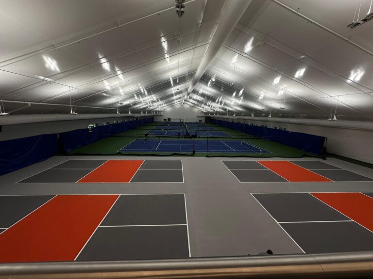 indoor sports arena with multiple courts