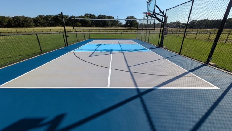 outdoor basketball court with fence